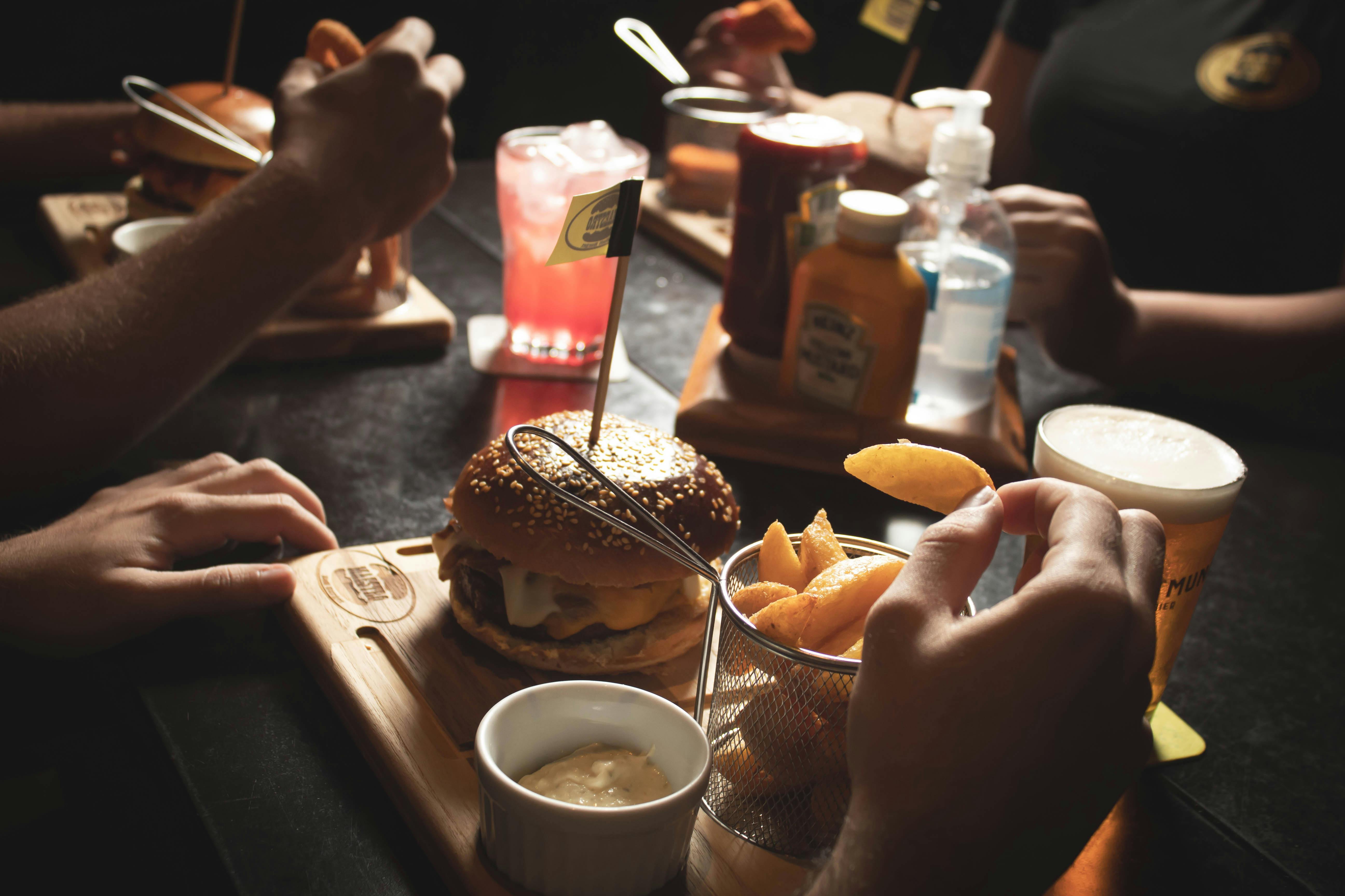 Burgers and fries on a restaurant table